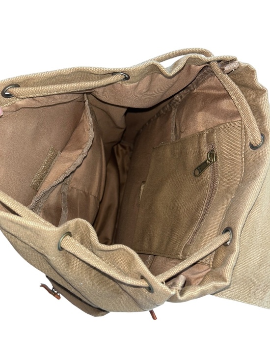 AMANGANI Jackson Hole Wyoming Luxury resort olive khaki cotton leather backpack